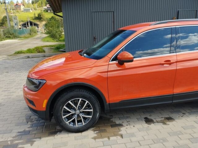 Червоний Фольксваген Тігуан, об'ємом двигуна 2 л та пробігом 104 тис. км за 16200 $, фото 3 на Automoto.ua