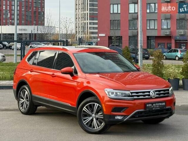 Красный Фольксваген Тигуан, объемом двигателя 2 л и пробегом 46 тыс. км за 22500 $, фото 1 на Automoto.ua