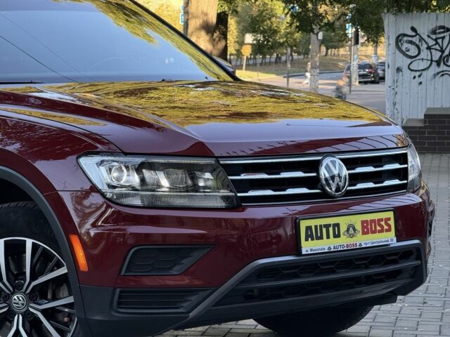 Червоний Фольксваген Тігуан, об'ємом двигуна 2 л та пробігом 99 тис. км за 20800 $, фото 9 на Automoto.ua