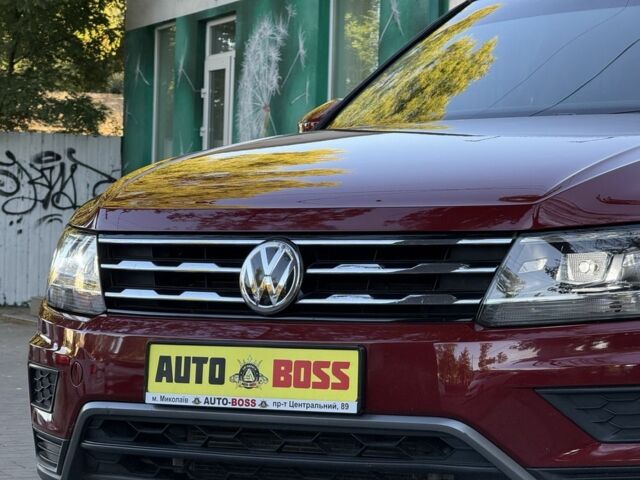 Червоний Фольксваген Тігуан, об'ємом двигуна 2 л та пробігом 99 тис. км за 20800 $, фото 3 на Automoto.ua