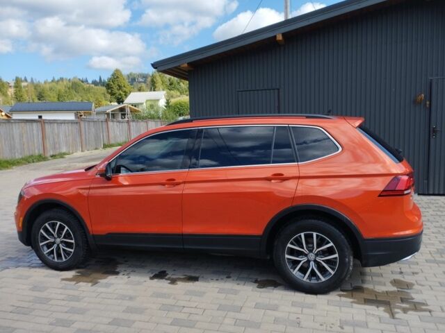 Червоний Фольксваген Тігуан, об'ємом двигуна 2 л та пробігом 104 тис. км за 16200 $, фото 1 на Automoto.ua