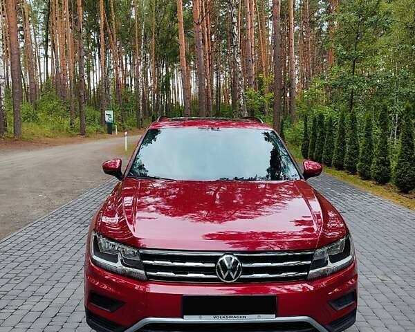 Червоний Фольксваген Тігуан, об'ємом двигуна 1.98 л та пробігом 140 тис. км за 17499 $, фото 2 на Automoto.ua