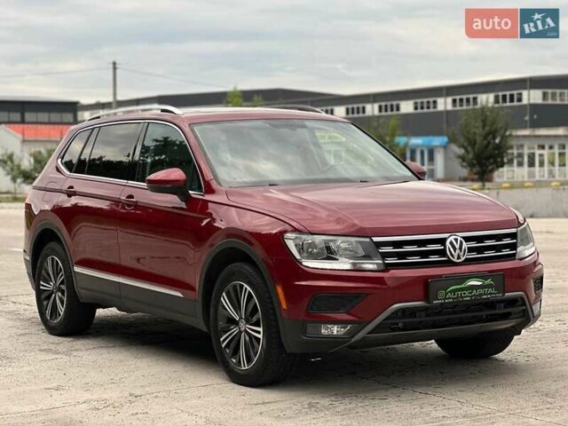 Красный Фольксваген Тигуан, объемом двигателя 2 л и пробегом 145 тыс. км за 19990 $, фото 3 на Automoto.ua