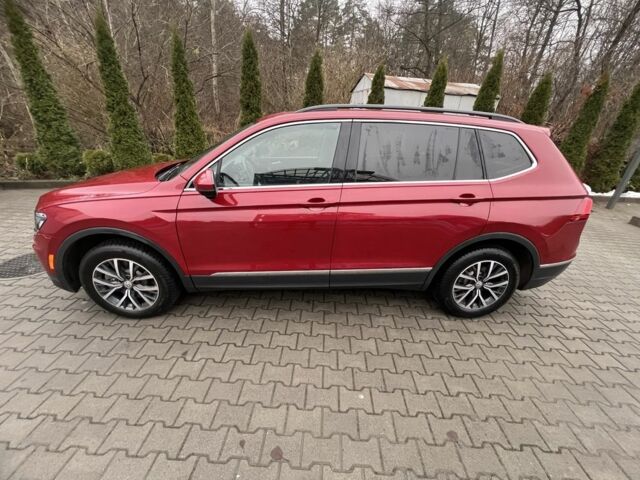 Красный Фольксваген Тигуан, объемом двигателя 2 л и пробегом 150 тыс. км за 19300 $, фото 5 на Automoto.ua