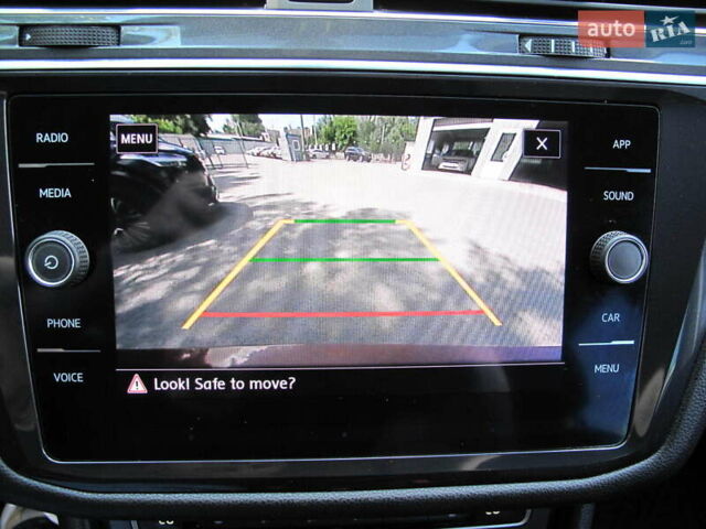 Красный Фольксваген Тигуан, объемом двигателя 2 л и пробегом 80 тыс. км за 21500 $, фото 68 на Automoto.ua