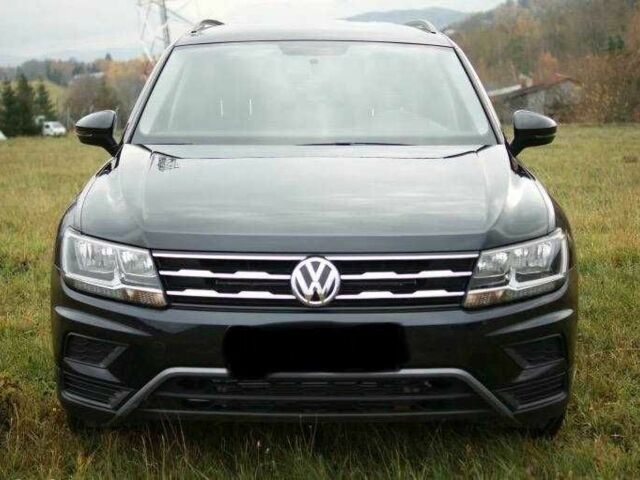 Красный Фольксваген Тигуан, объемом двигателя 2 л и пробегом 35 тыс. км за 13200 $, фото 6 на Automoto.ua