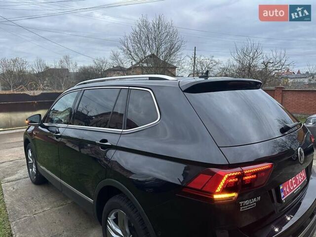 Красный Фольксваген Тигуан, объемом двигателя 2.03 л и пробегом 218 тыс. км за 27950 $, фото 32 на Automoto.ua