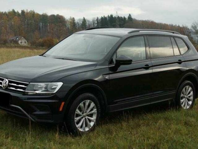 Красный Фольксваген Тигуан, объемом двигателя 2 л и пробегом 35 тыс. км за 13200 $, фото 5 на Automoto.ua