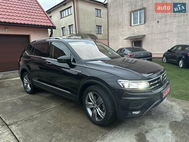 Красный Фольксваген Тигуан, объемом двигателя 2.03 л и пробегом 218 тыс. км за 27950 $, фото 35 на Automoto.ua