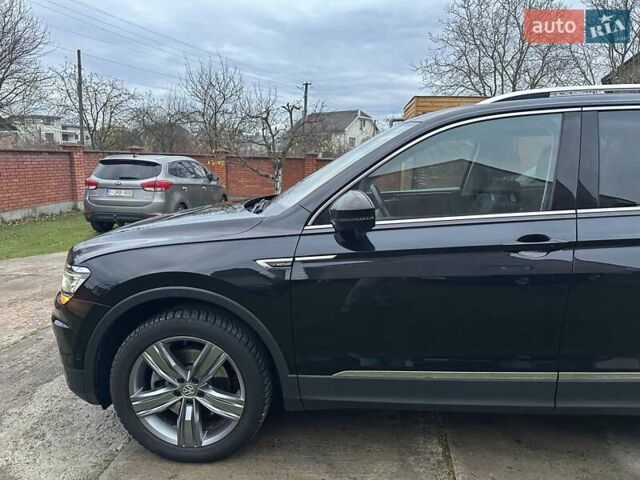 Красный Фольксваген Тигуан, объемом двигателя 2.03 л и пробегом 218 тыс. км за 27950 $, фото 28 на Automoto.ua