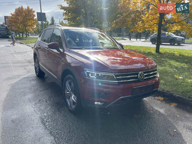 Червоний Фольксваген Тігуан, об'ємом двигуна 1.98 л та пробігом 74 тис. км за 22100 $, фото 1 на Automoto.ua