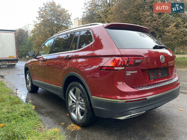 Червоний Фольксваген Тігуан, об'ємом двигуна 1.98 л та пробігом 74 тис. км за 22100 $, фото 2 на Automoto.ua