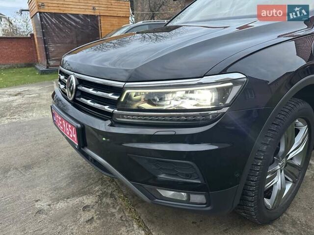 Красный Фольксваген Тигуан, объемом двигателя 2.03 л и пробегом 218 тыс. км за 27950 $, фото 17 на Automoto.ua