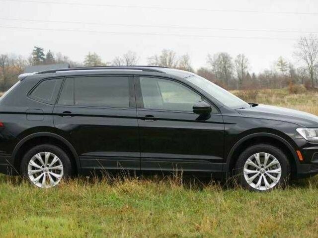 Красный Фольксваген Тигуан, объемом двигателя 2 л и пробегом 35 тыс. км за 13200 $, фото 4 на Automoto.ua