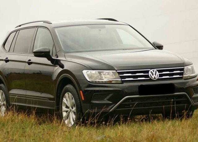 Красный Фольксваген Тигуан, объемом двигателя 2 л и пробегом 35 тыс. км за 13200 $, фото 1 на Automoto.ua