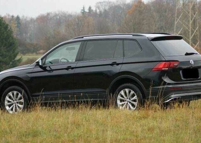 Красный Фольксваген Тигуан, объемом двигателя 2 л и пробегом 35 тыс. км за 13200 $, фото 2 на Automoto.ua