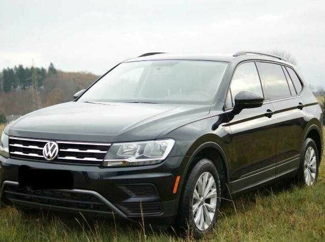 Красный Фольксваген Тигуан, объемом двигателя 2 л и пробегом 35 тыс. км за 13200 $, фото 7 на Automoto.ua