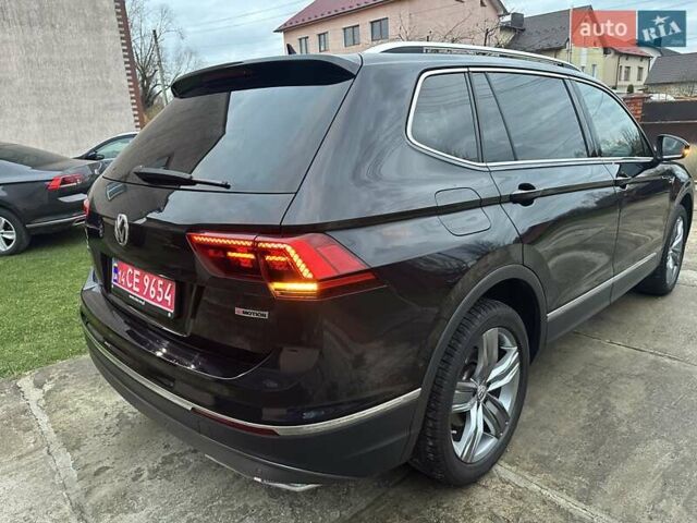 Красный Фольксваген Тигуан, объемом двигателя 2.03 л и пробегом 218 тыс. км за 27950 $, фото 23 на Automoto.ua