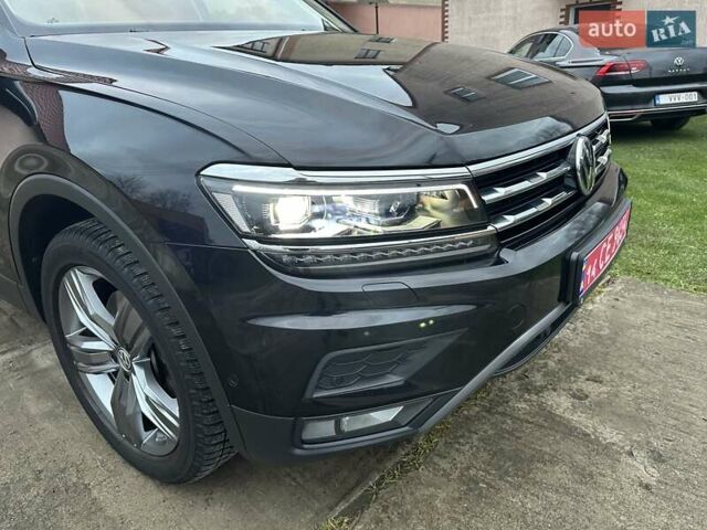 Красный Фольксваген Тигуан, объемом двигателя 2.03 л и пробегом 218 тыс. км за 27950 $, фото 16 на Automoto.ua