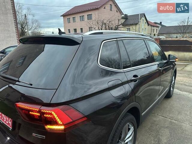 Красный Фольксваген Тигуан, объемом двигателя 2.03 л и пробегом 218 тыс. км за 27950 $, фото 31 на Automoto.ua