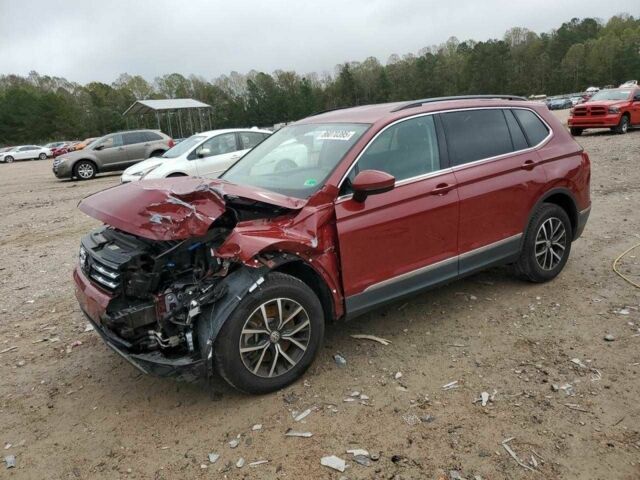 Красный Фольксваген Тигуан, объемом двигателя 2 л и пробегом 97 тыс. км за 13000 $, фото 2 на Automoto.ua