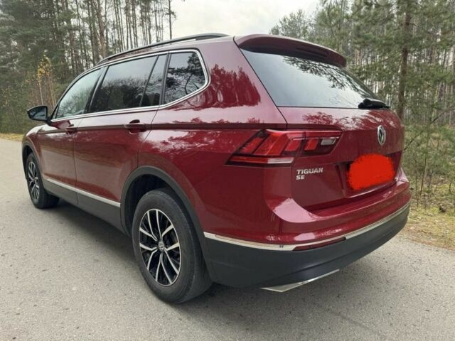 Красный Фольксваген Тигуан, объемом двигателя 0 л и пробегом 106 тыс. км за 14500 $, фото 3 на Automoto.ua