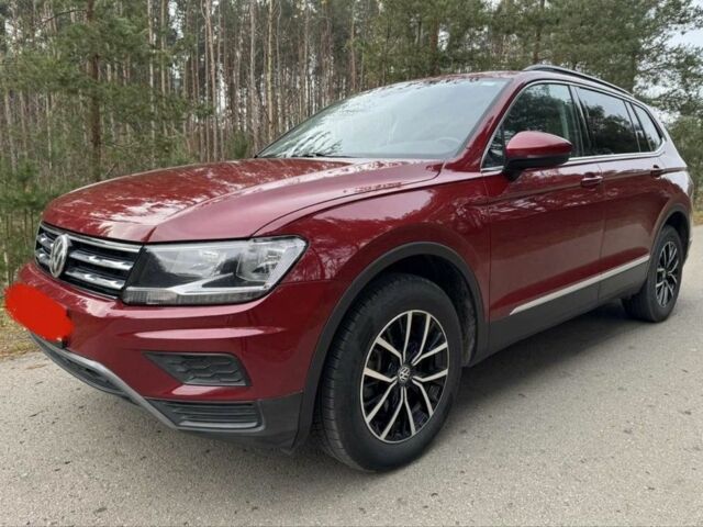 Красный Фольксваген Тигуан, объемом двигателя 0 л и пробегом 106 тыс. км за 14500 $, фото 1 на Automoto.ua