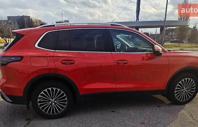 Красный Фольксваген Тигуан, объемом двигателя 1.97 л и пробегом 32 тыс. км за 45000 $, фото 2 на Automoto.ua