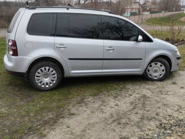 Серый Фольксваген Тигуан, объемом двигателя 1.9 л и пробегом 245 тыс. км за 8600 $, фото 4 на Automoto.ua