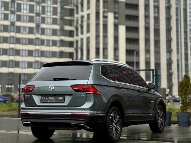 Серый Фольксваген Тигуан, объемом двигателя 2 л и пробегом 155 тыс. км за 18500 $, фото 2 на Automoto.ua