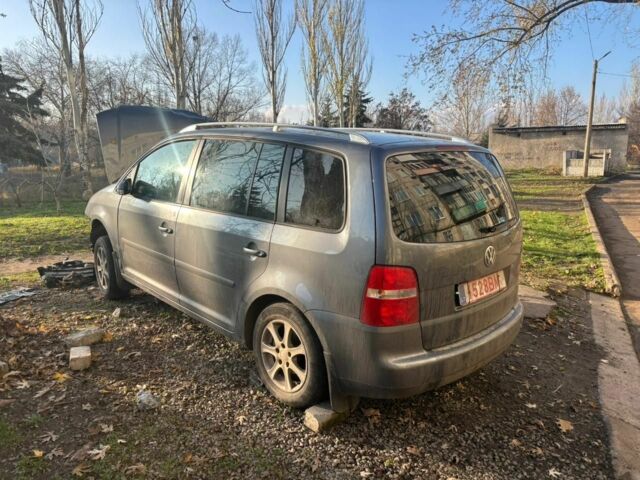 Серый Фольксваген Тигуан, объемом двигателя 2 л и пробегом 140 тыс. км за 1425 $, фото 3 на Automoto.ua