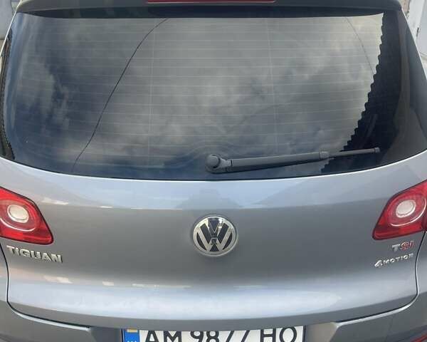 Серый Фольксваген Тигуан, объемом двигателя 1.39 л и пробегом 260 тыс. км за 7500 $, фото 7 на Automoto.ua