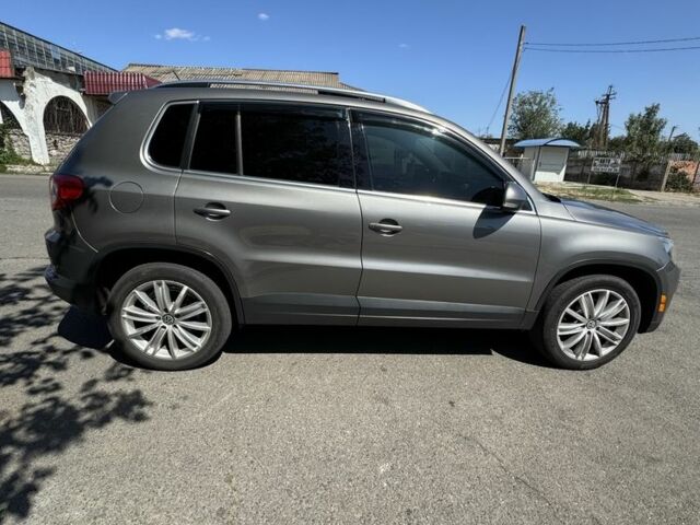 Серый Фольксваген Тигуан, объемом двигателя 2 л и пробегом 222 тыс. км за 9800 $, фото 3 на Automoto.ua