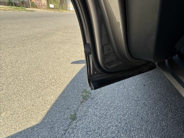 Серый Фольксваген Тигуан, объемом двигателя 2 л и пробегом 222 тыс. км за 9800 $, фото 7 на Automoto.ua