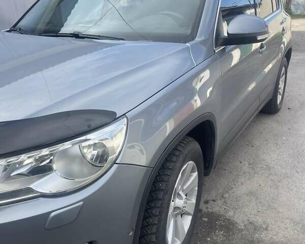 Серый Фольксваген Тигуан, объемом двигателя 1.39 л и пробегом 260 тыс. км за 7500 $, фото 4 на Automoto.ua