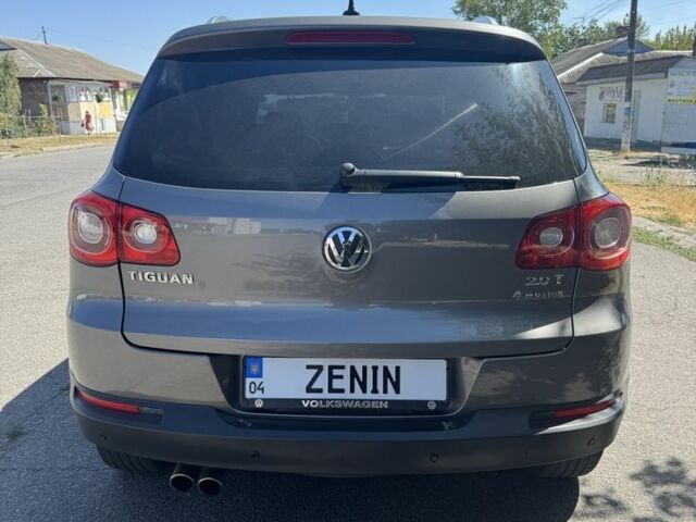 Серый Фольксваген Тигуан, объемом двигателя 2 л и пробегом 222 тыс. км за 9800 $, фото 2 на Automoto.ua