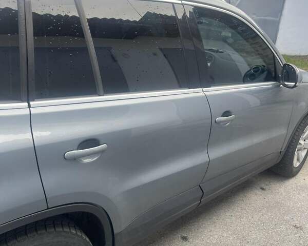 Серый Фольксваген Тигуан, объемом двигателя 1.39 л и пробегом 260 тыс. км за 7500 $, фото 8 на Automoto.ua