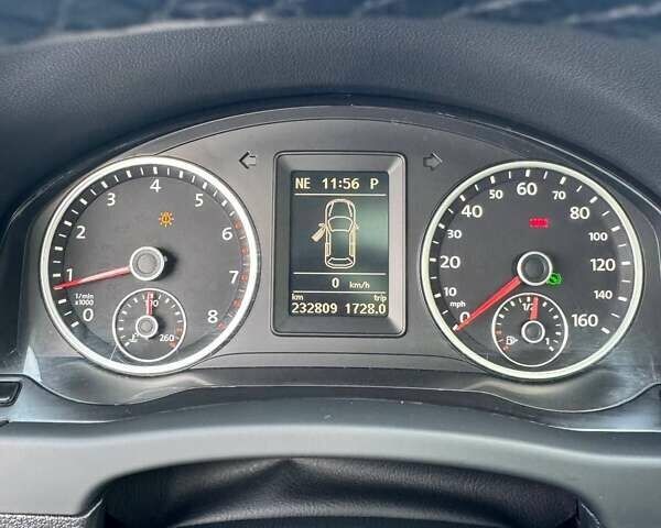 Сірий Фольксваген Тігуан, об'ємом двигуна 2 л та пробігом 233 тис. км за 9500 $, фото 3 на Automoto.ua