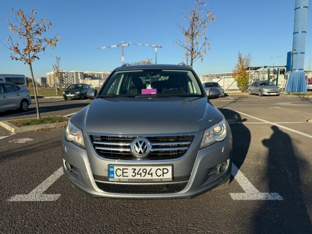 Серый Фольксваген Тигуан, объемом двигателя 2 л и пробегом 244 тыс. км за 14000 $, фото 1 на Automoto.ua