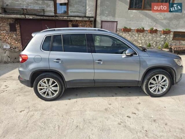 Сірий Фольксваген Тігуан, об'ємом двигуна 2 л та пробігом 300 тис. км за 10300 $, фото 5 на Automoto.ua