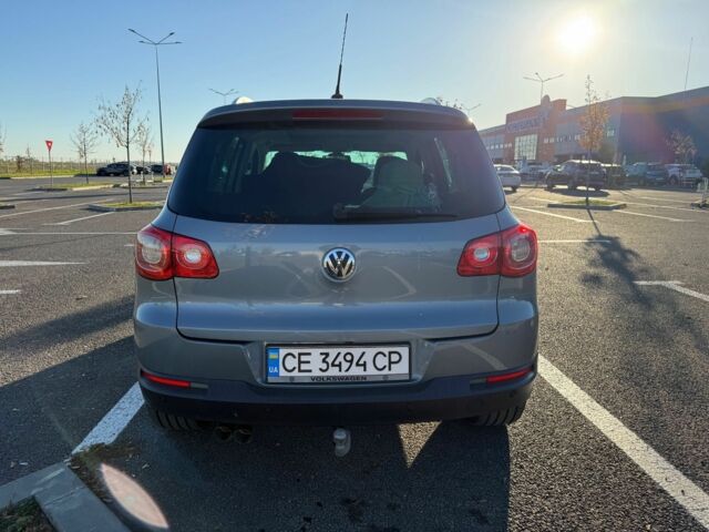 Серый Фольксваген Тигуан, объемом двигателя 2 л и пробегом 244 тыс. км за 14000 $, фото 3 на Automoto.ua