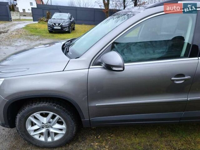 Сірий Фольксваген Тігуан, об'ємом двигуна 2 л та пробігом 115 тис. км за 11200 $, фото 25 на Automoto.ua