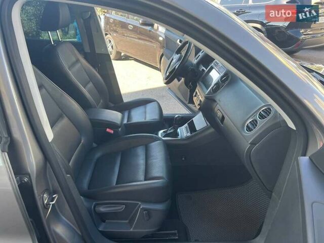 Серый Фольксваген Тигуан, объемом двигателя 2 л и пробегом 201 тыс. км за 11400 $, фото 19 на Automoto.ua