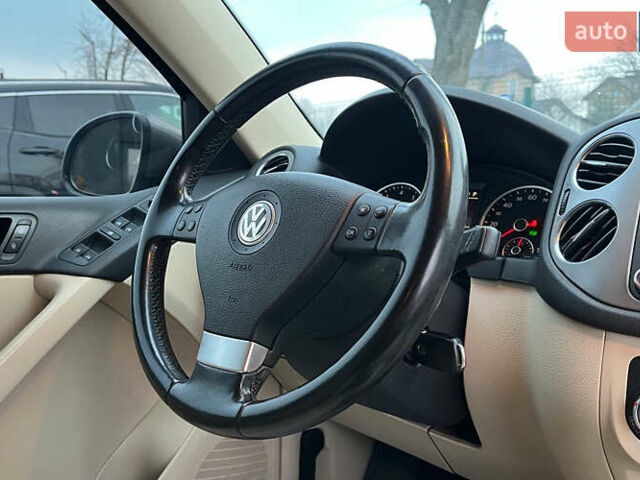 Серый Фольксваген Тигуан, объемом двигателя 1.98 л и пробегом 244 тыс. км за 11000 $, фото 18 на Automoto.ua