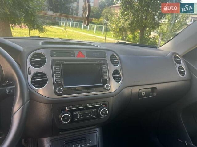 Серый Фольксваген Тигуан, объемом двигателя 1.98 л и пробегом 116 тыс. км за 11200 $, фото 19 на Automoto.ua