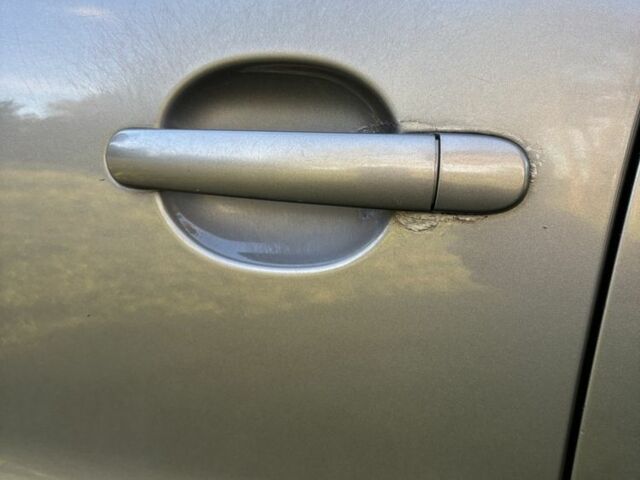 Сірий Фольксваген Тігуан, об'ємом двигуна 2 л та пробігом 203 тис. км за 10800 $, фото 11 на Automoto.ua