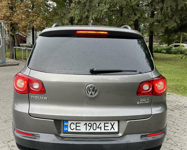 Сірий Фольксваген Тігуан, об'ємом двигуна 1.98 л та пробігом 250 тис. км за 9999 $, фото 26 на Automoto.ua