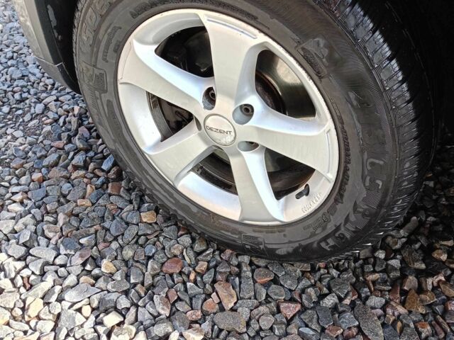 Серый Фольксваген Тигуан, объемом двигателя 2 л и пробегом 252 тыс. км за 11700 $, фото 4 на Automoto.ua