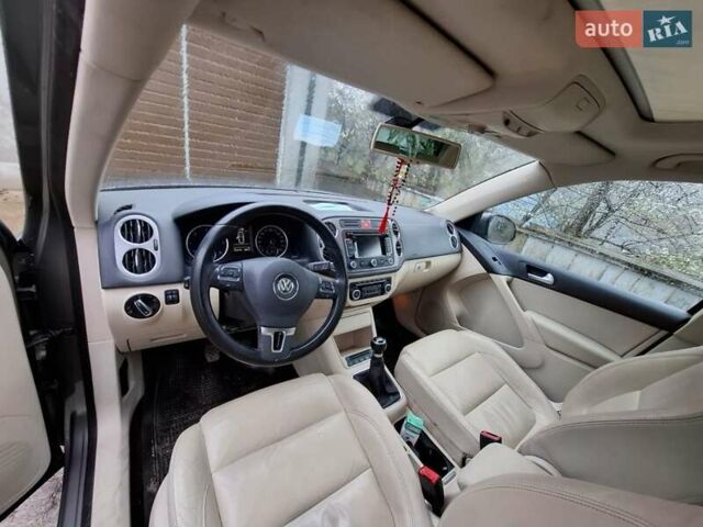 Серый Фольксваген Тигуан, объемом двигателя 1.97 л и пробегом 223 тыс. км за 15800 $, фото 17 на Automoto.ua