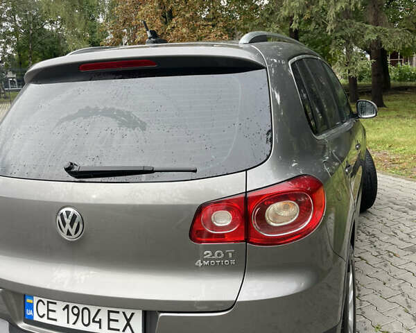 Сірий Фольксваген Тігуан, об'ємом двигуна 1.98 л та пробігом 250 тис. км за 9999 $, фото 3 на Automoto.ua
